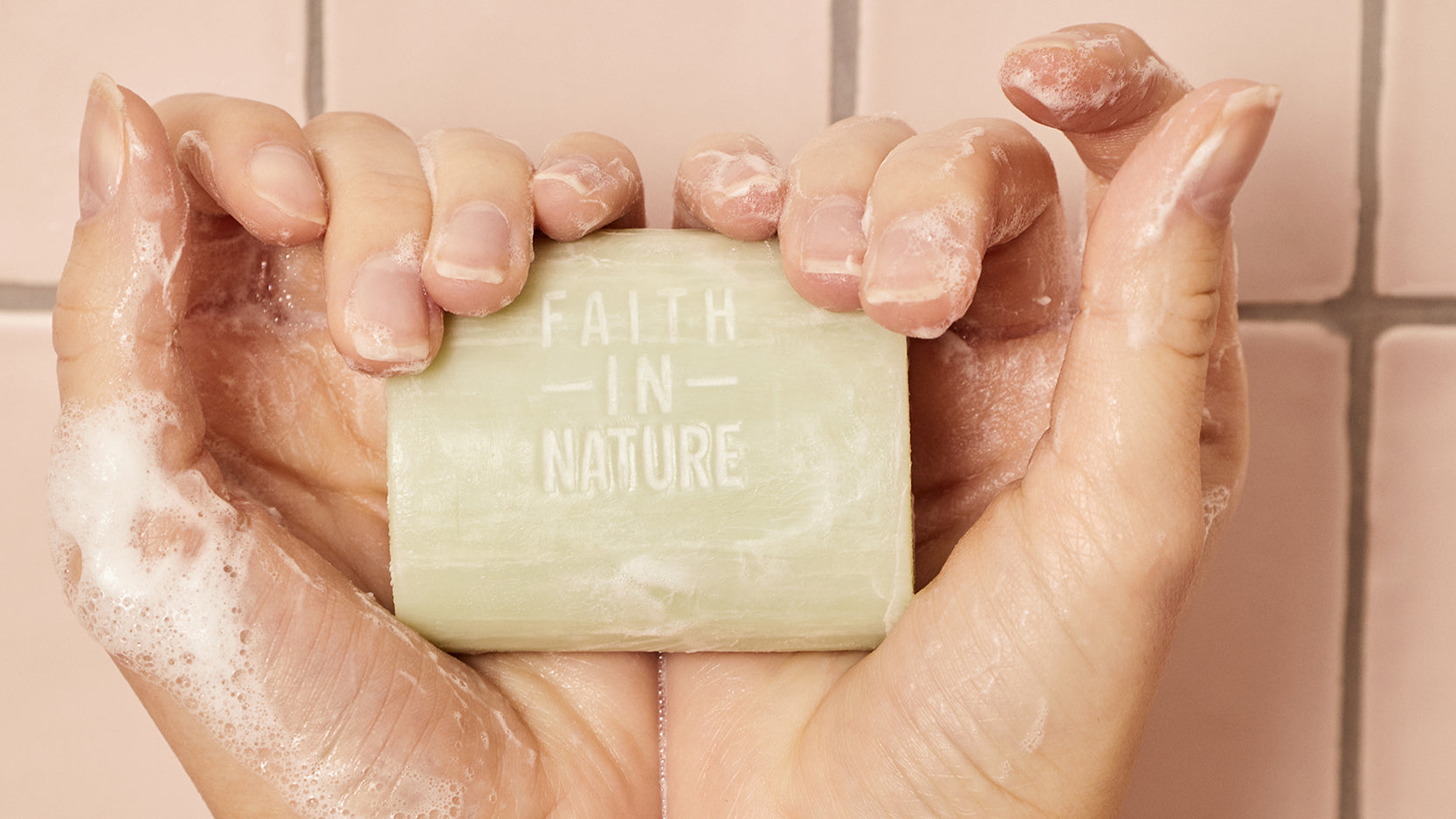 Bar of soap in hands