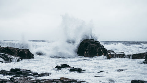 Waves crashing on rocks